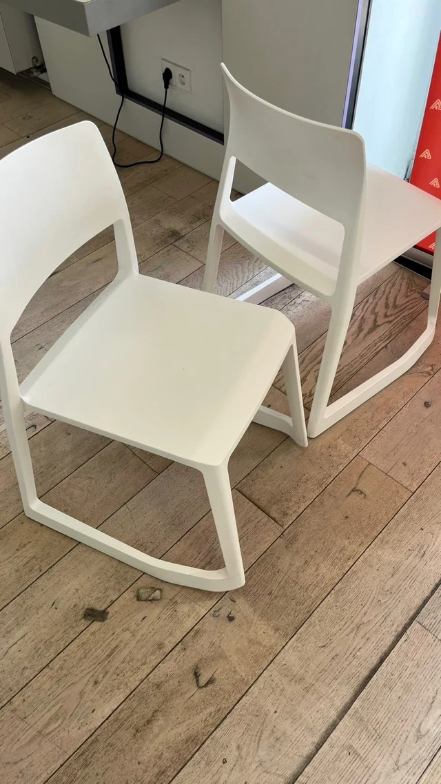 White chairs after cleaning, photographed from a different angle.